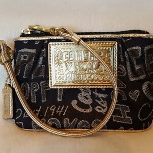 Coach Black and Gold Poppy Wristlet